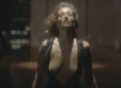 Tatjana Patitz flashing her bare tit at Rising Sun