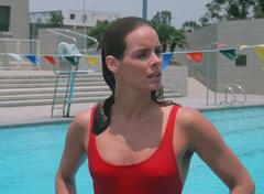 Alexandra Paul pokies in wet red swimsuit at Baywatch Season 3
