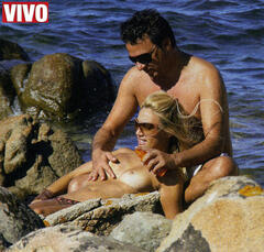 Mary Carbone topless on a beach with honey