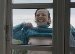 Patrycia Ziolkowska shows her nude tits in a window at Spätwerk