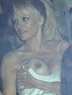 Pamela Anderson tit slip at the Chateau Marmont
