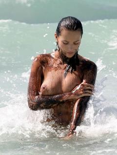 Lucy Clarkson naked in a water