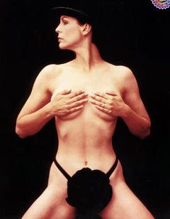 Jamie Lee Curtis topless in a hat cover her tits