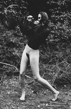 Olivia North bottomless in nature shows her hairy pussy