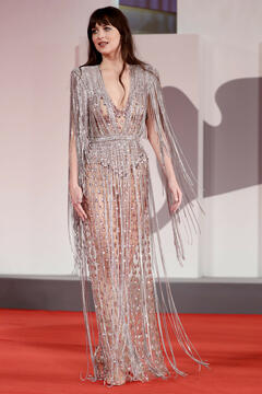 Dakota Johnson in see through dress at premiere of The Lost Daughter at the Venice Film Festival