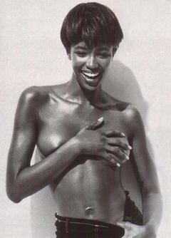 Young Naomi Campbell topless cover her tits