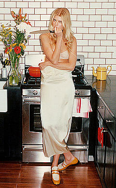 Maryna Linchuk sexy in a kitchen