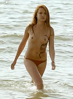 Juliet Lemonnier nude topless in a sea scene from Hotel de la plage