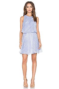 Carolina Sanchez in short blue dress shows legd