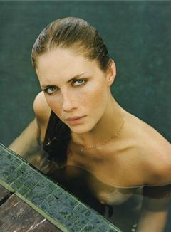 Ana Claudia Michels topless in a water