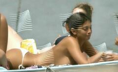 Alessia Mancini sunbathing topless