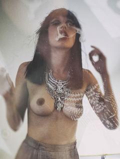 Olivia North smoking topless