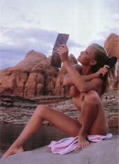 Bo Derek sitting fully nude