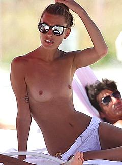 Sveva Alviti caught topless on the beach