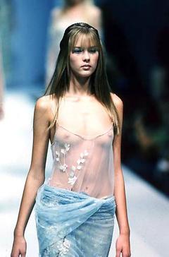 Gianne Albertoni walks runway braless in see through top