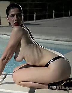 Julia de Castro topless poolside for Interviu