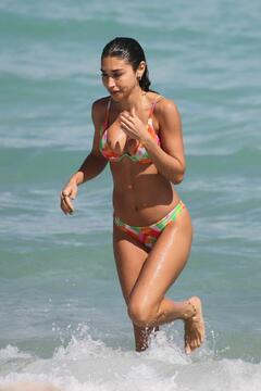 Chantel Jeffries wears a multi-colored bikini as she hits the beach with a friend in Miami - February 28, 2024