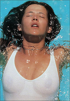French Sophie Marceau in see through swimwear in a pool