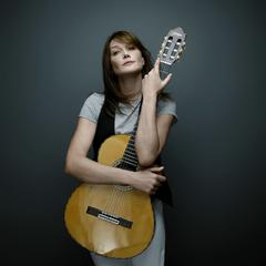 Italian-French singer-songwriter and former supermodel Carla Bruni with guitar