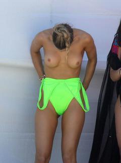 Joy Corrigan topless during photoshoot