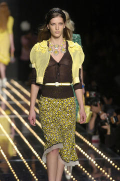 Diana Dondoe in see through blouse runway image