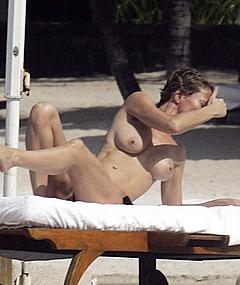 Karen Mulder tanning topless