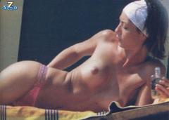 Ilaria Galassi sunbathing topless paparazzi photo