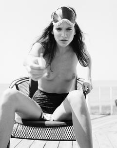 Ines Rivero sitting topless black-&-white photo