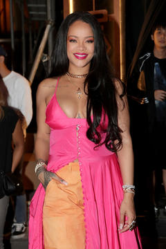 Rihanna out in Seoul shows cleavage