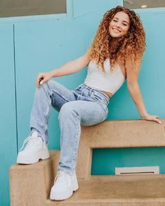 Sofie Dossi in white top and jeans