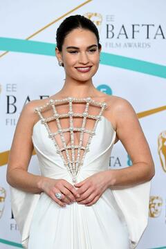 Lily James cleavage at BAFTA Film Awards 2023 in London - February 2023