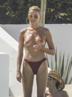 Brooks Nader topless on the beach in Cabo San Lucas