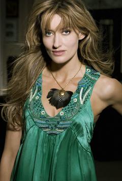 Natascha McElhone in green dress