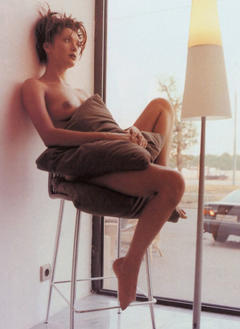 Russian actress Olga Drozdova sitting naked