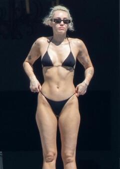 Miley Cyrus in black bikini in Cabo San Lucas