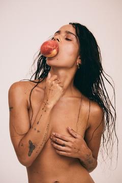 Zoe Kravitz topless cover her tits