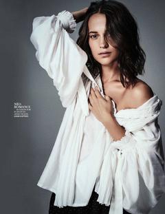 Alicia Vikander posing for magazine
