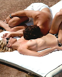 Sharon Stone tanning topless in Pantelleria