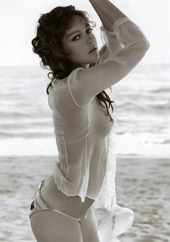 Cristiana Capotondi in white see through top