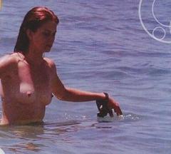 Marian Aguilera topless in a water paparazzi photo