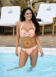 Casey Batchelor in bikini poolside in Tenerife