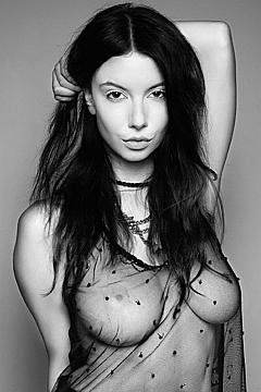 Olivia Rose nude boobs under see through top