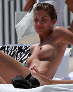 Yaya Kosikova topless on a beach