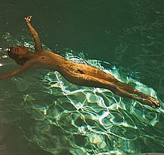 Nicole Branch fully nude in a water