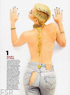Miley Cyrus braless in jeans