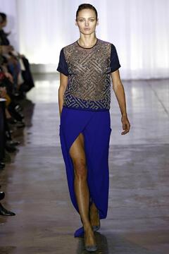 Karmen Pedaru walks runway in sheer dress