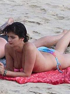 Shermine Shahrivar sunbathing topless