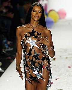 Naomi Campbell in see through outfit runway image