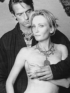 French singer Patricia Kaas topless but covered