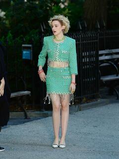 Julia Garner leggy on the set of Inventing Anna in New York City